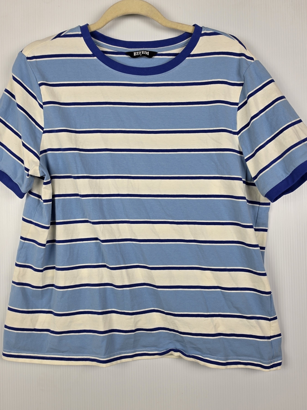 Women’s Blue & White Striped Short Sleeve Tee by BTEBM